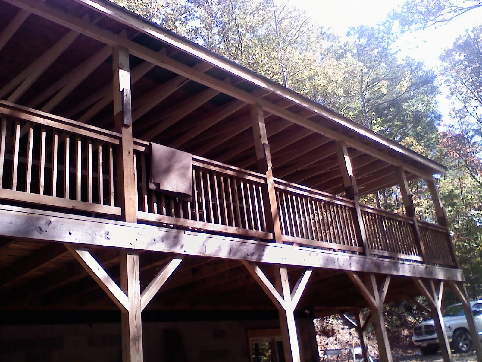 Timber framing under a new elevated porch and deck — Roof Leak Repair in Rivesville by Roofing Brothers